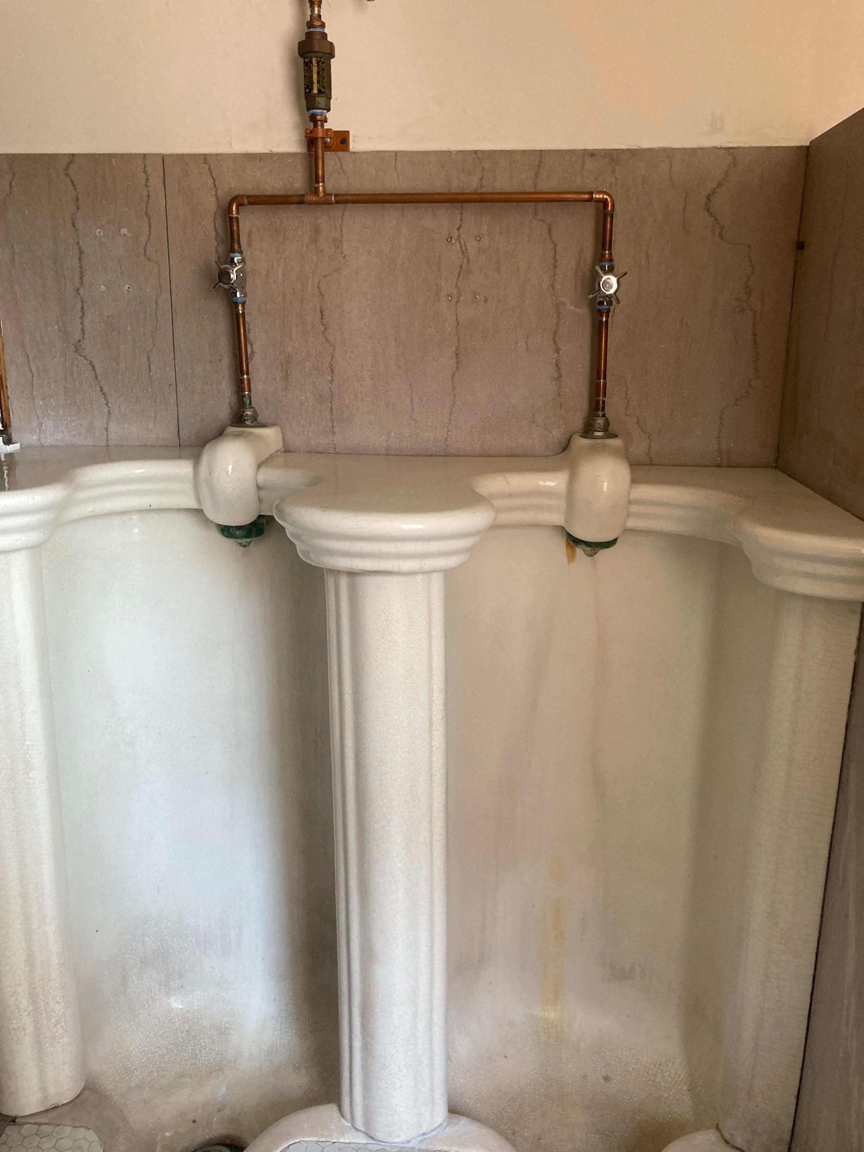 Historic urinal restored to working condition